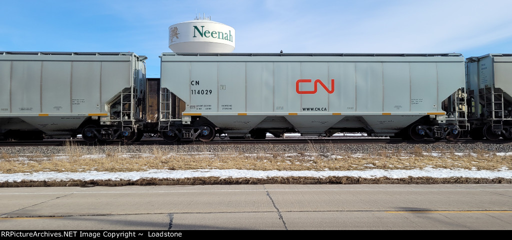 CN 114029